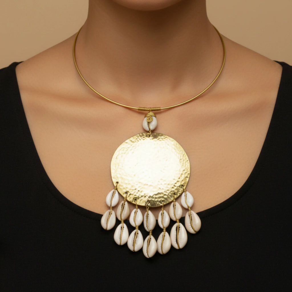 Brass and cowrie shell necklace
