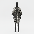 Mannequin wearing a patterned robe on a white background