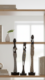 Decorative bookshelf with statues and books in a modern interior setting