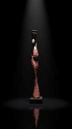 Tall, abstract sculpture with wavy patterns on a dark background