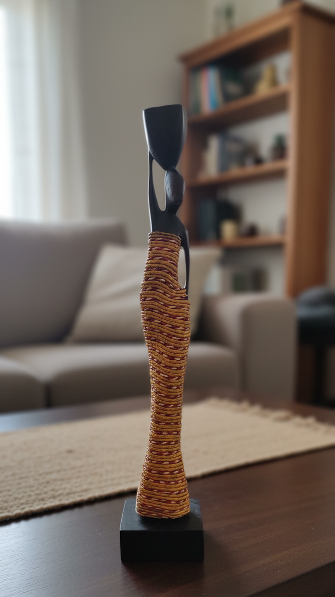 Decorative sculpture on a wooden surface with a blurred background