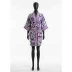 Purple floral patterned robe on a mannequin against a white background